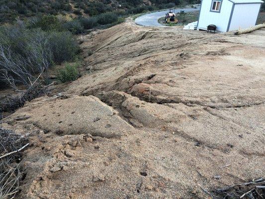 washed out slope to reapir