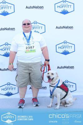 Malone and I finishing a 5K.