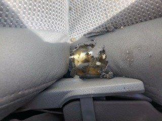 This is a closeup of the rat damage to the seat.