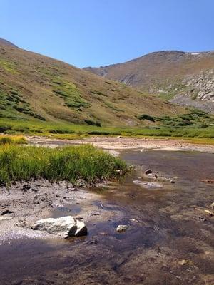 At the peak of the trail-- and the base of the mountains !