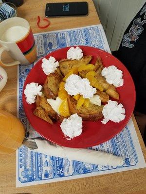 FRENCH TOAST TOPPED WITH PEACHES AND CREAM 4.99