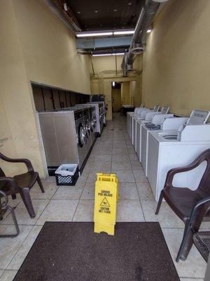 Small laundromat. Not very busy but practical and easy to use. Not the cleanest bathroom though.