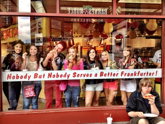 Matt chowing down on a hot dog with his group of girls from Kalamazoo, MI.