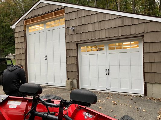 Carriage garage door with fame work