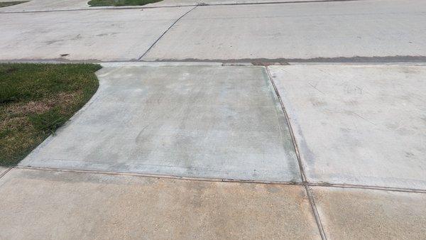 Driveway Pic 2 concrete within 6 months of closing