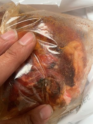 The rotten meat you can see from the bag