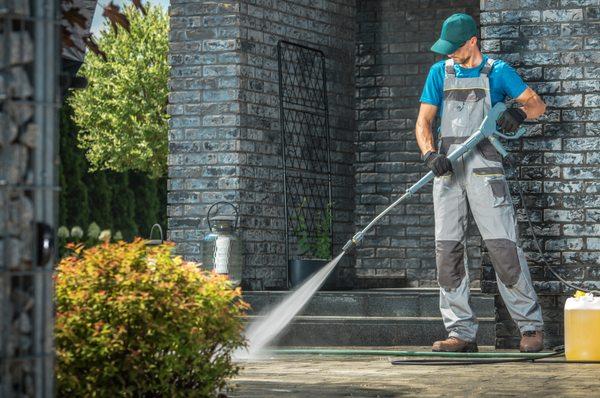 Power washing driveways and homes