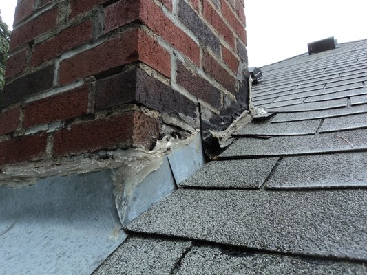 Inadequate flashing around chimney