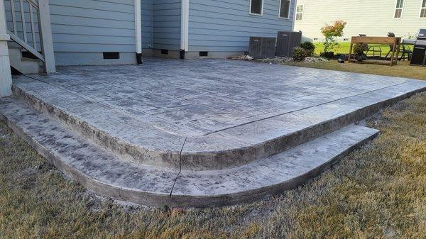 Stamped and sealed concrete patio