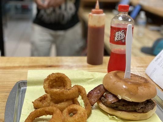 The signature burger with a pork patty and a hamburger patty