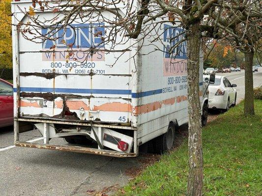 Alpine Windows truck parked along 8th Ave. N.W. in Seattle (Old...?)