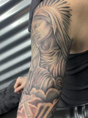 Virgin Mary tattoo