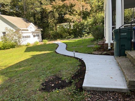 Curved concrete sidewalk installations