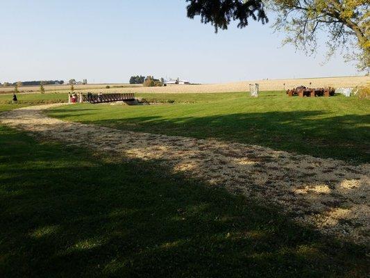 Perfect midwest setting. Outdoor ceremony just steps away from barn venue for reception.