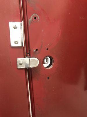 Broken handle on stall in men's room.