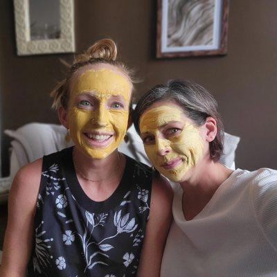 Gwen and Hillary trying out the pumpkin face mask.before.Girls Night Out! event.