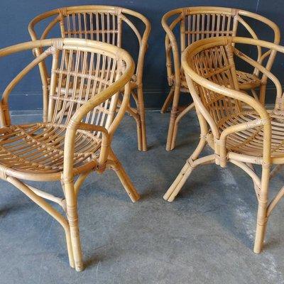 Vintage bamboo barrel back chairs.