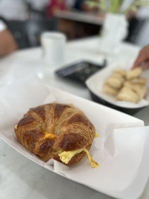 Croissant with sausage, egg and cheese