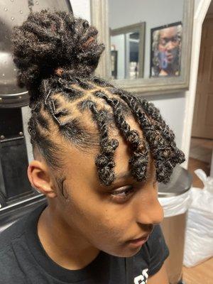 Loc Bun + Bangs on a child in New Orleans