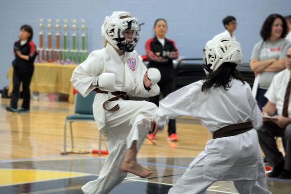 HKC Student (left) sparring in the AAU Southeast Regional Tournament in Charlotte NC, in 2019