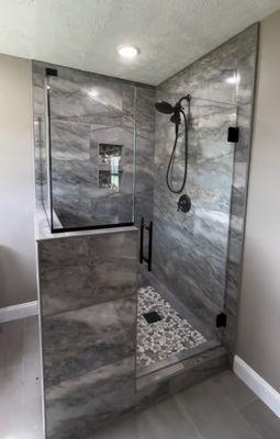 Custom shower glass with u-channel and back to back ladder pull