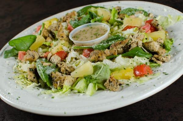 Grilled chicken and pineapple salad, with fresh mint and fresh basil, tomatoes , onions and parmesan , served with balsamic