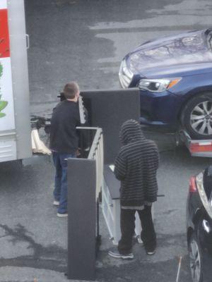 Here they are taking apart my bed, which they didnt need to and they didn't put it back together