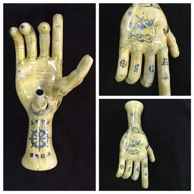 Tattooed hand pipe made by Phil