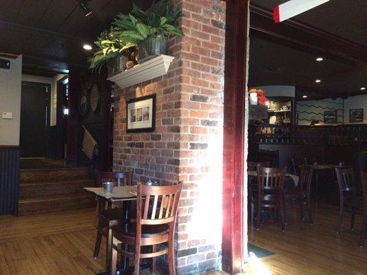 A side table. Beautiful brick column.