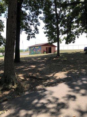 Restrooms are located near the playground and large picnic area.