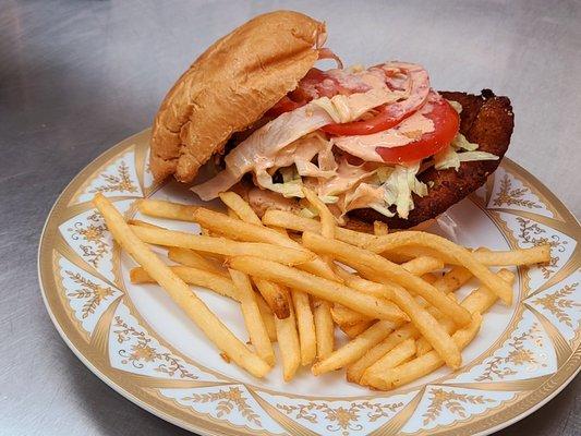 Chicken Sandwich,  Breaded Chicken, Chipotle Ranch, lettuce, Tomato on a roll