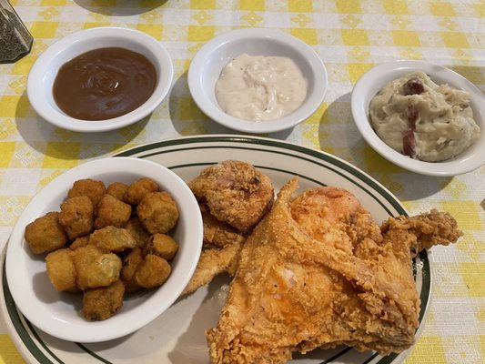 Fried chicken, mashed potatoes and fried okra.