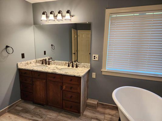 Yorktowne vanity and granite countertop, tulip lights