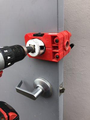 Opening a hole to install a new deadbolt for higher security