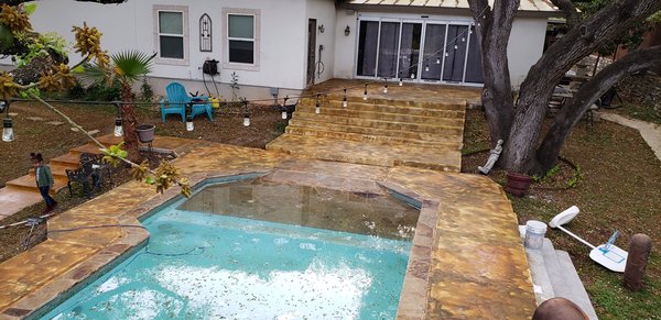 Updated concrete around pool with fresh color.