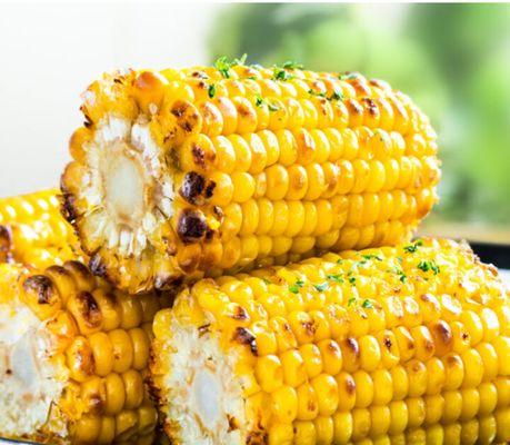 Seasoned Corn on the Cob.  With a little burnt to it. So Delicious. You'll definitely need some floss after devouring this Corn