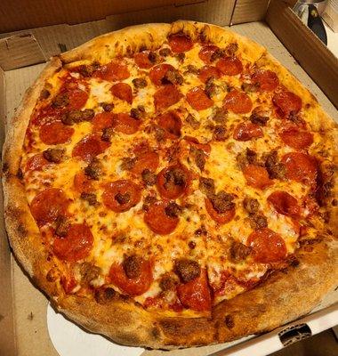 Pizza with pepperoni and sausage