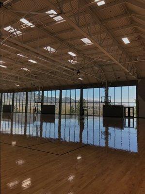 Check out this inspiring view at the University of Colorado at Boulder! Can you imagine playing basketball or exercising next to it?