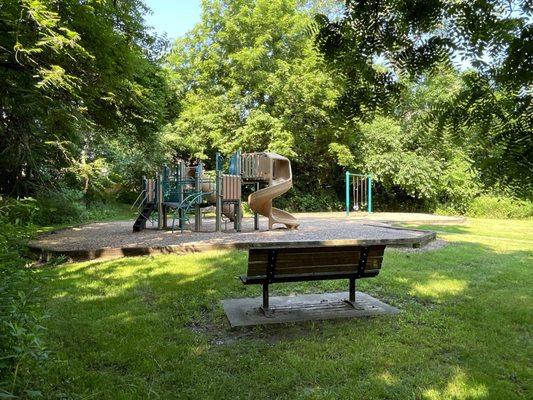 Play Area with Park Benches on Either Side