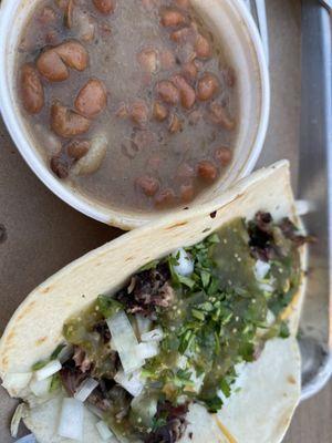 Brisket taco with beans.