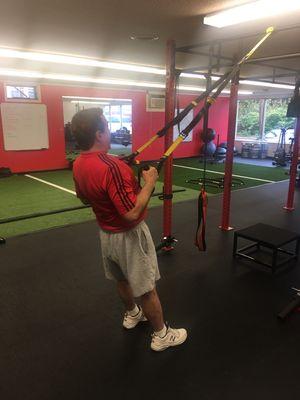 Marky performing the TRX low row!