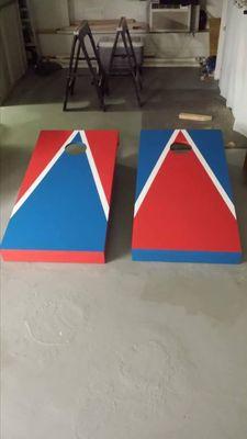 Home-made cornhole boards with lights.