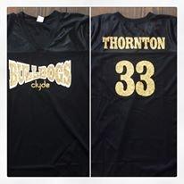 Custom jersey with glitter vinyl lettering.