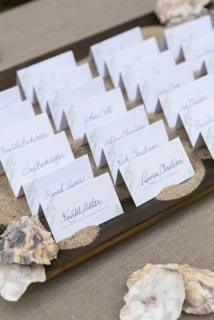 Letterpress escort cards custom designed by Nessa Sander.