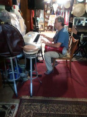 Walid playing keyboard with Drum