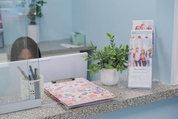 Check-in area - Our medical clinic team works together to ensure your privacy, comfort, and respectful high quality service you deserve.