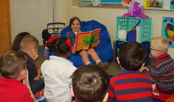 Preschoolers reading to each other