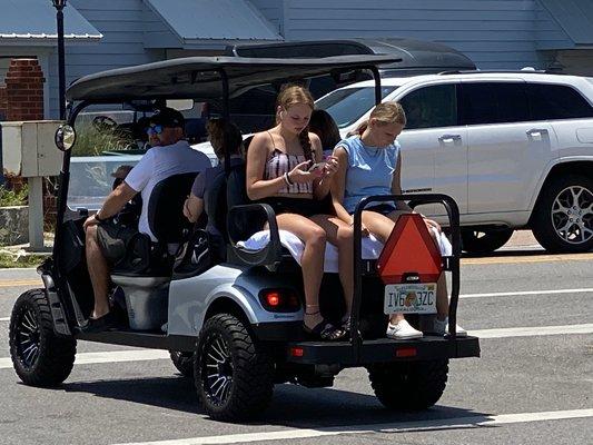 The family will love taking the golf cart to the beach!