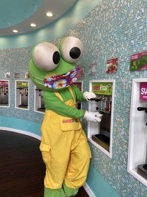 Mascot scoop pouring yogurt