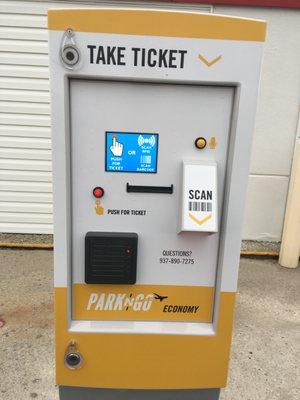 Push button to take a ticket, or scan your reservation or Fast Pass, then enter the lot and the bus will come right to you.